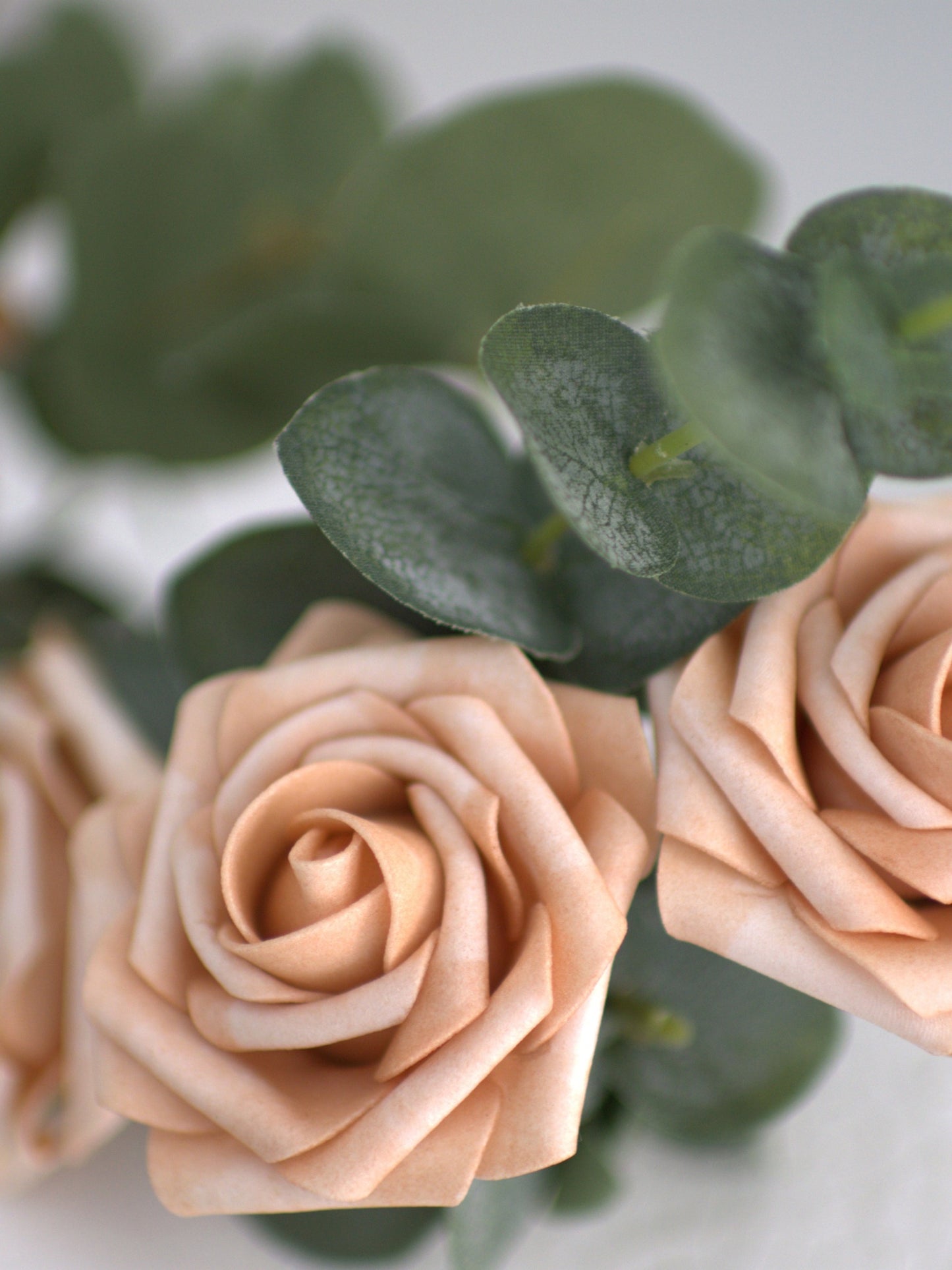 Close-up of Four Beige Rose Cake Topper, showcasing the high-quality artificial petals and intricate details, designed to bring lasting beauty to your cake.