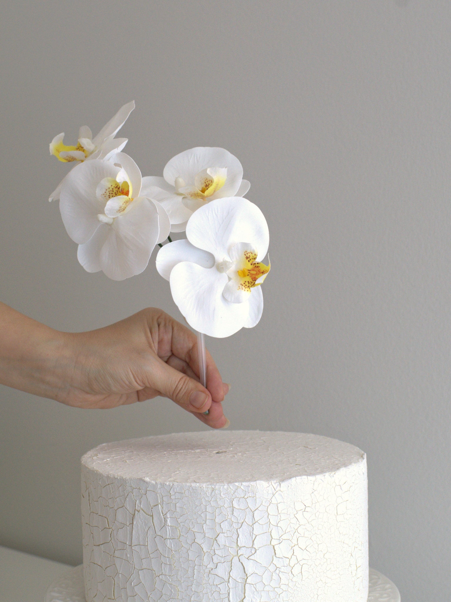 easy to use no design skill needed to place the orchid cake tpper