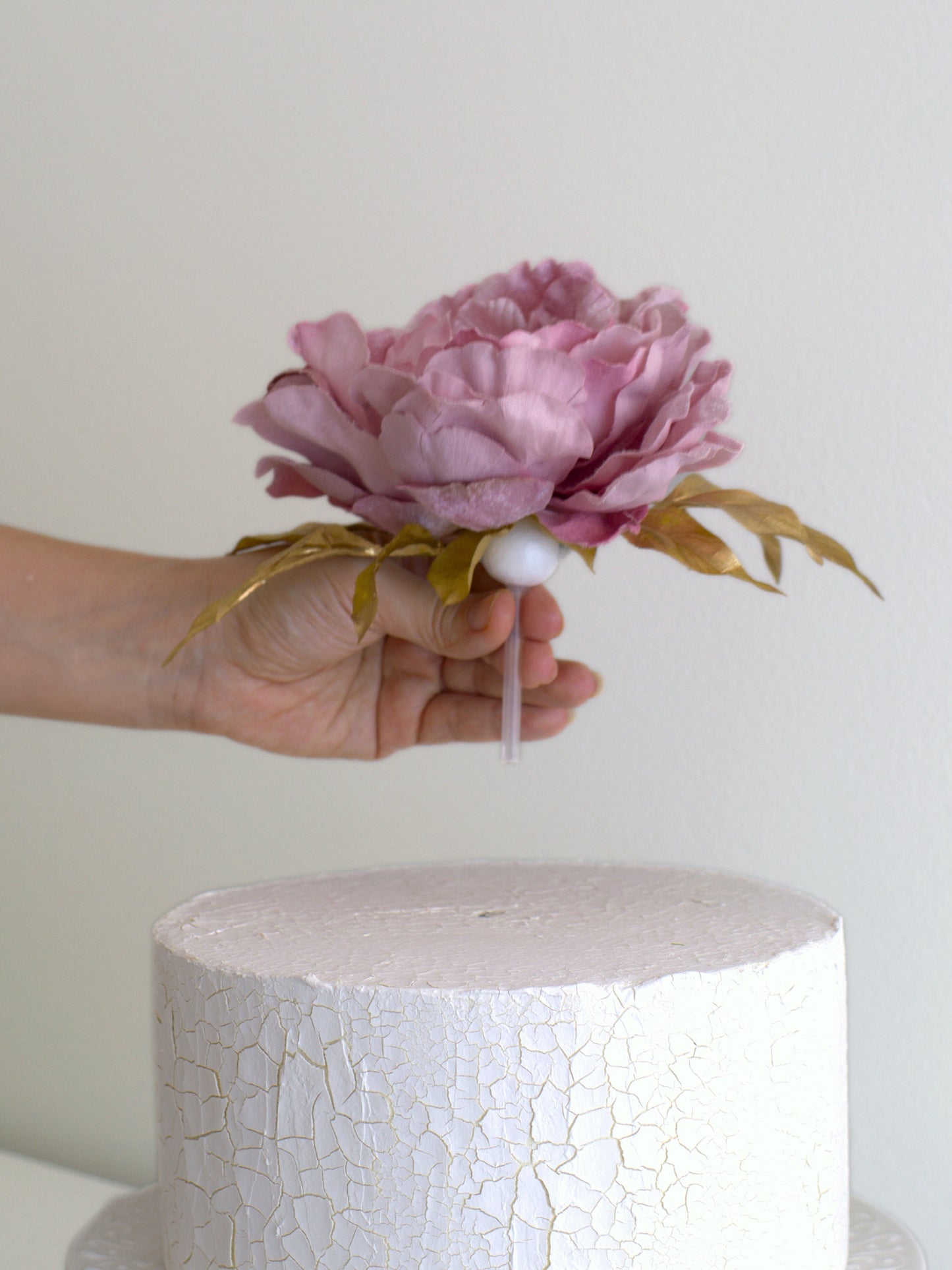 Peony Vintage Cake Topper with Gold Leaf, effortlessly applied to a cake, showing how simple it is to add instant elegance with high-quality artificial flowers.