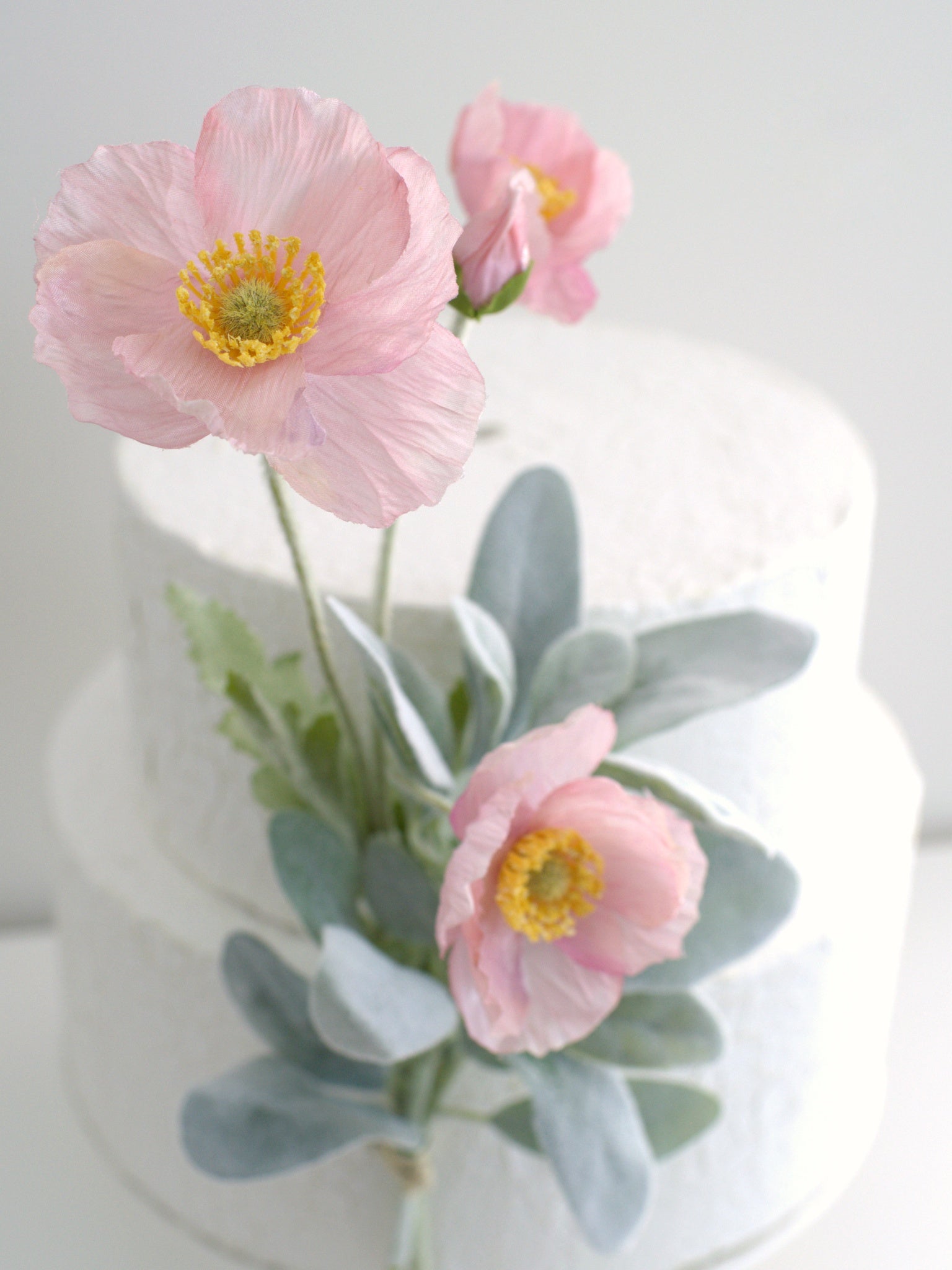 Close-up of an Anemone flower, highlighting the intricate details and high-quality artificial petals, designed to look lifelike and durable for cake decorations.