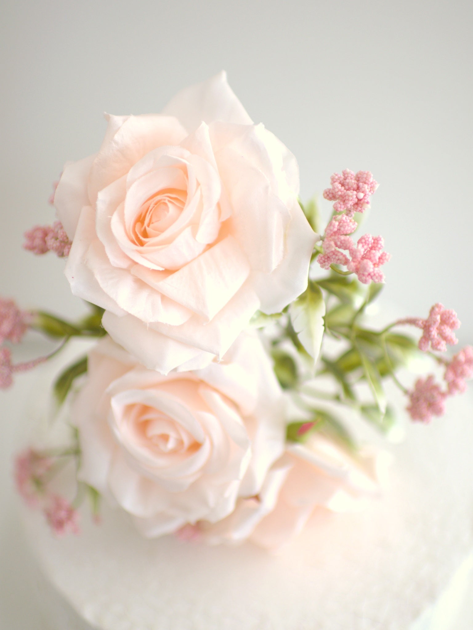 Close-up of the Set of Two Violet Floral Cake Toppers, highlighting the realistic texture and premium quality of the high-quality artificial flowers.